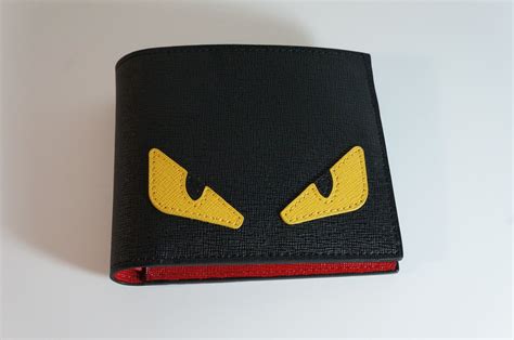 fendi monster leather wallet on chain|fendi monster eyes bifold wallet.